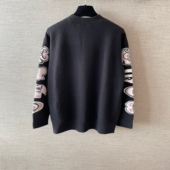 Chanel Black Knit Cardigan with Cartoon Embroidery Combines Luxury and Whimsical - Picture 7 of 8